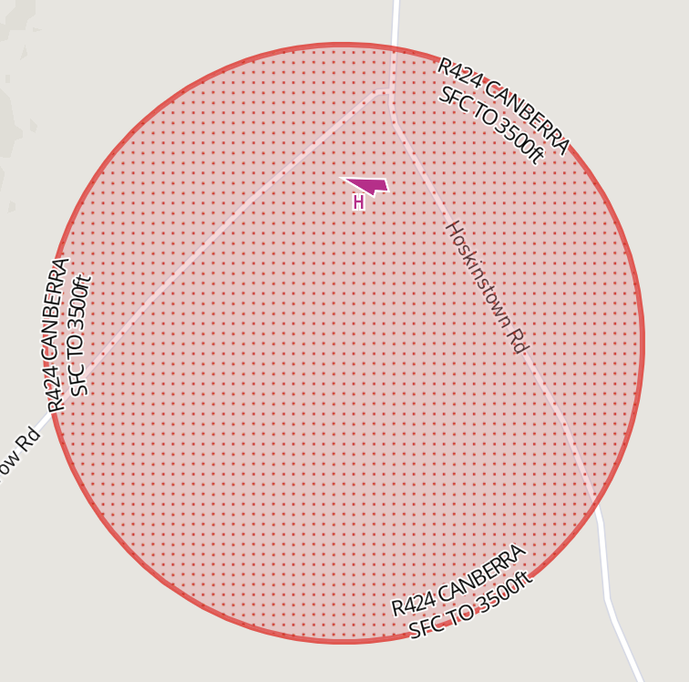 Active restricted airspace shown with a red border and dotted fill